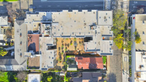 aerial view of acton courtyard, top down view, street parking available.